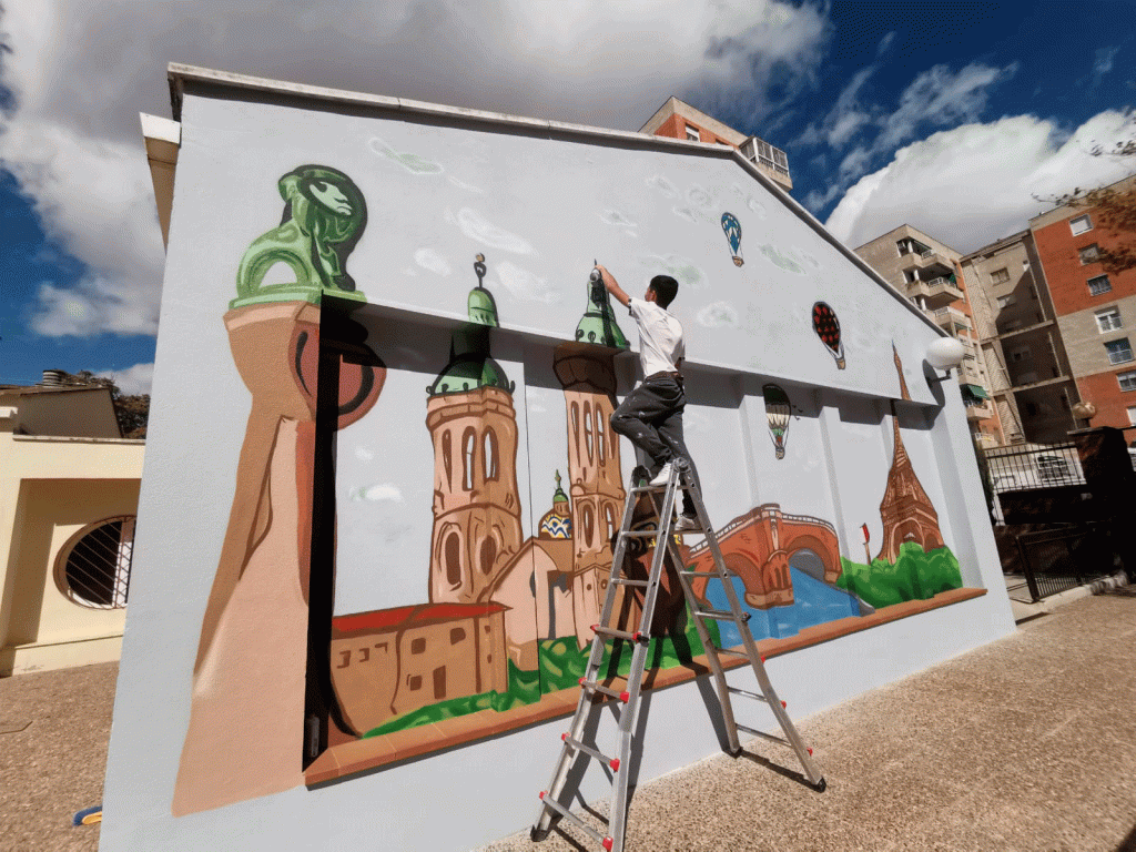PABLO TERMINANDO EL MURAL